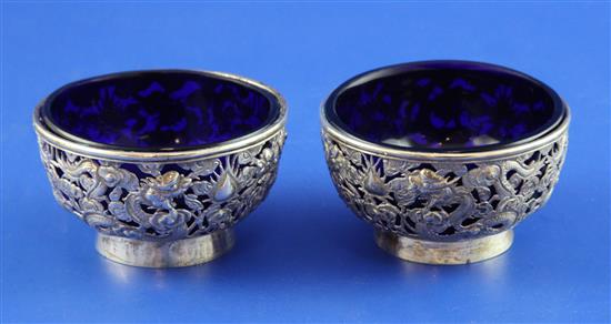 A pair of late 19th/early 20th century Chinese pierced silver tub shaped salts by Wang Hing & Co, Hong Kong, 3in.